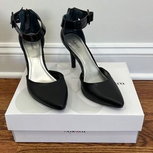 Black and patent leather pumps